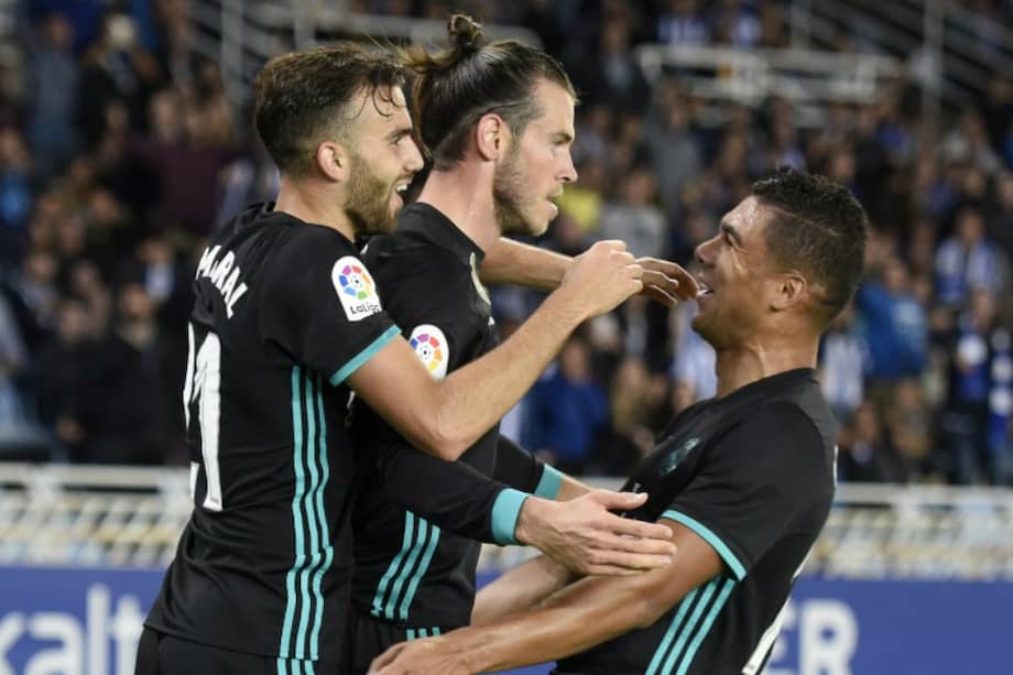 El galés Gareth Bale (c) anotó el tercer gol en la victoria de Real Madrid este domingo. / AFP