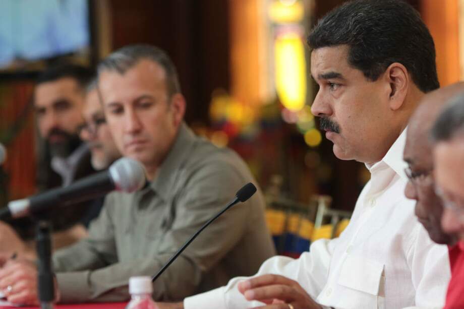 El presidente de Venezuela, Nicolas Maduro, junto al vicepresidente, Tareck El Aissami. / EFE