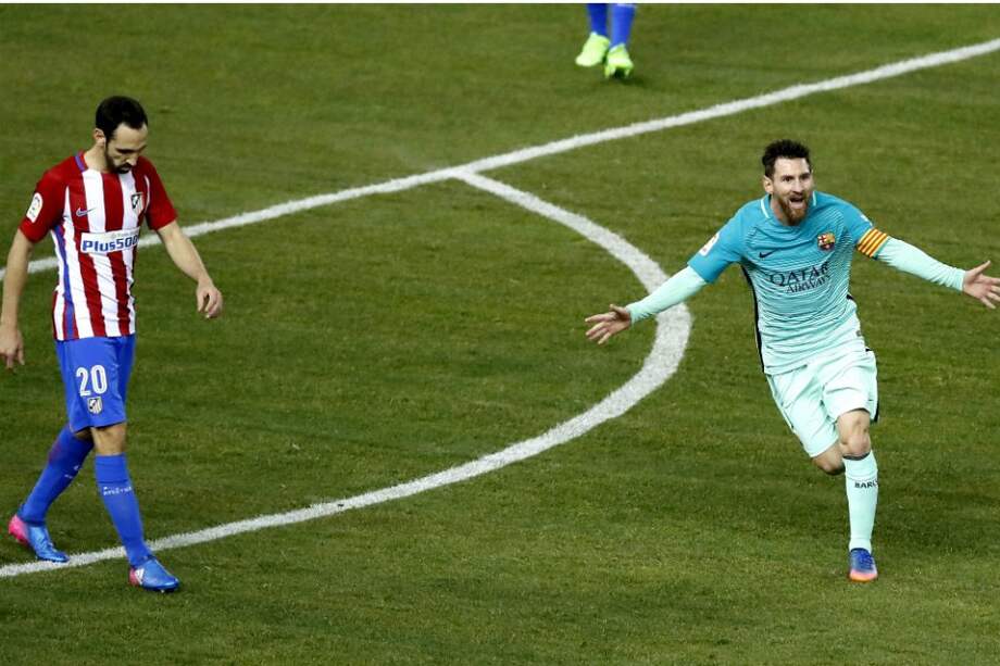 Messi celebrando su anotación ante el Atlético. / EFE