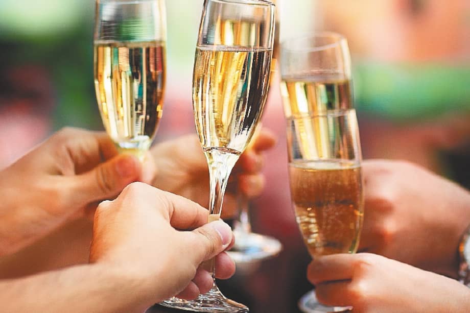 Celebration. People holding glasses of champagne making a toast