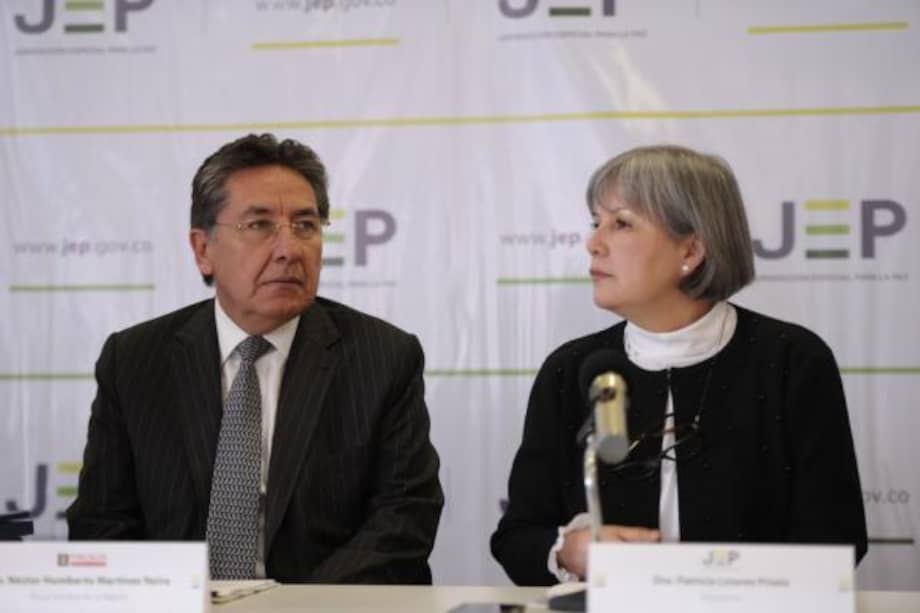 El fiscal general, Néstor Humberto Martínez, y Patricia Linares, presidenta de la JEP. / Mauricio Alvarado
