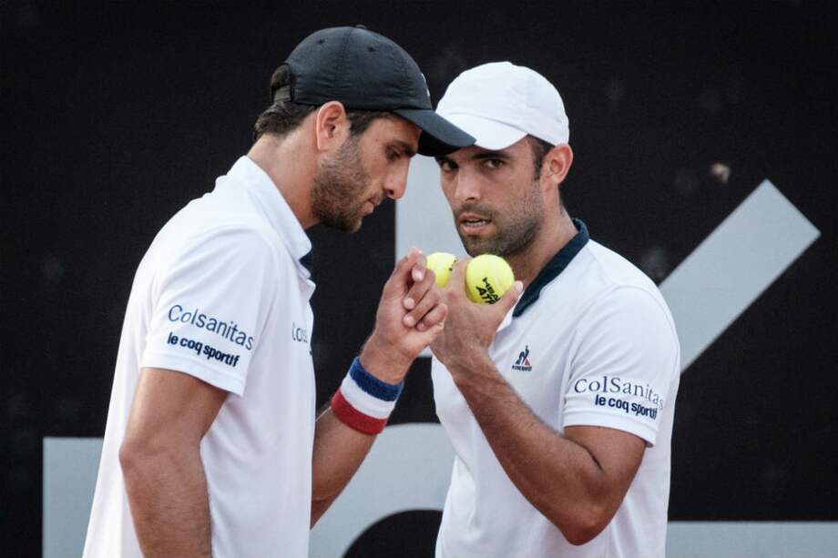 Cabal y Farah avanzan a segunda ronda en Madrid. / AFP