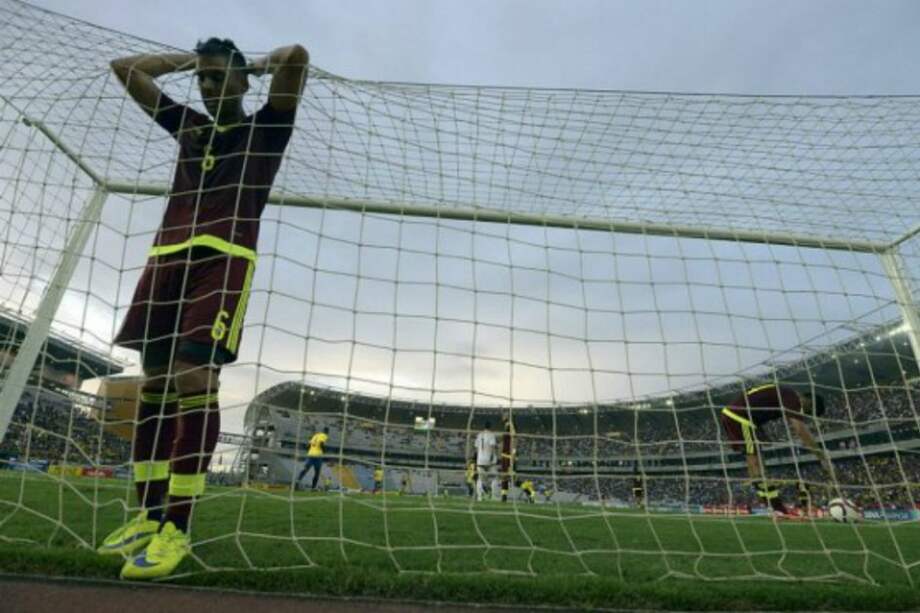 Jugador de la selección venezolana se lamenta por un gol recibido en las eliminatorias. Foto: AFP