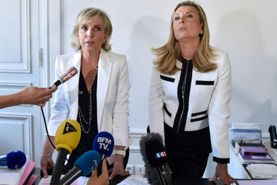 Janine Bonaggiunta (izq) y Nathalie Tomasini (der), abogadas de Jacqueline Sauvage, acusada de homicidio. / AFP