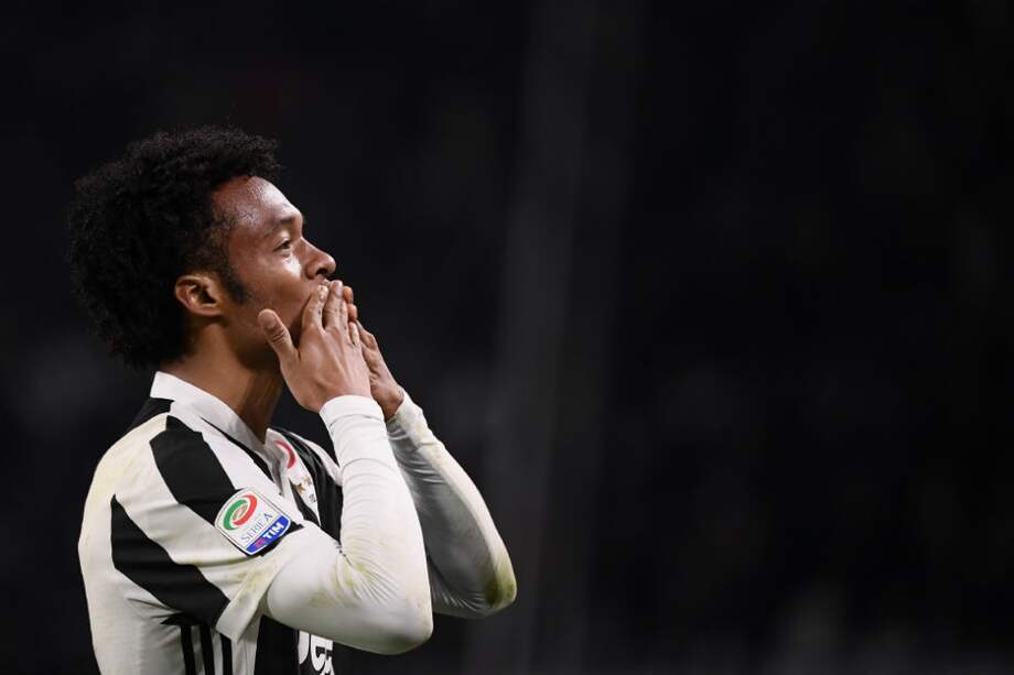 Juan Guillermo Cuadrado celebra su gol frente al Milan. / AFP