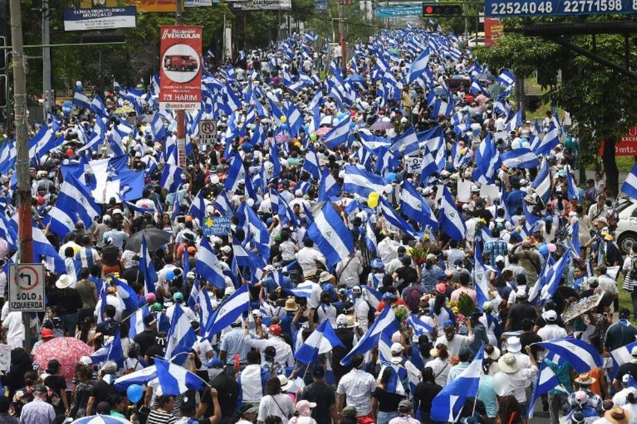 Las calles de Managua durante la Marcha de las Flores. / AFP