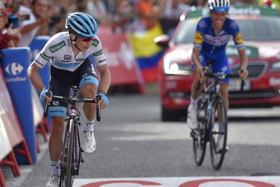 López (izquierda) logró su segundo podio en una grande tras la gran etapa de este sábado en la ronda ibérica. / AFP