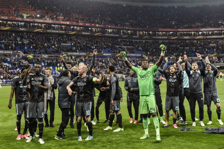 Los jugadores del Ajax celebran el paso a la final de la Liga de Europa. / AFP