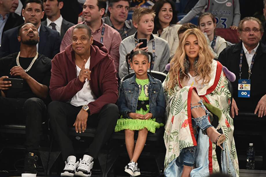 Beyoncé junto a su esposo Jay Z y su hija Blue Ivy Carter. / AFP