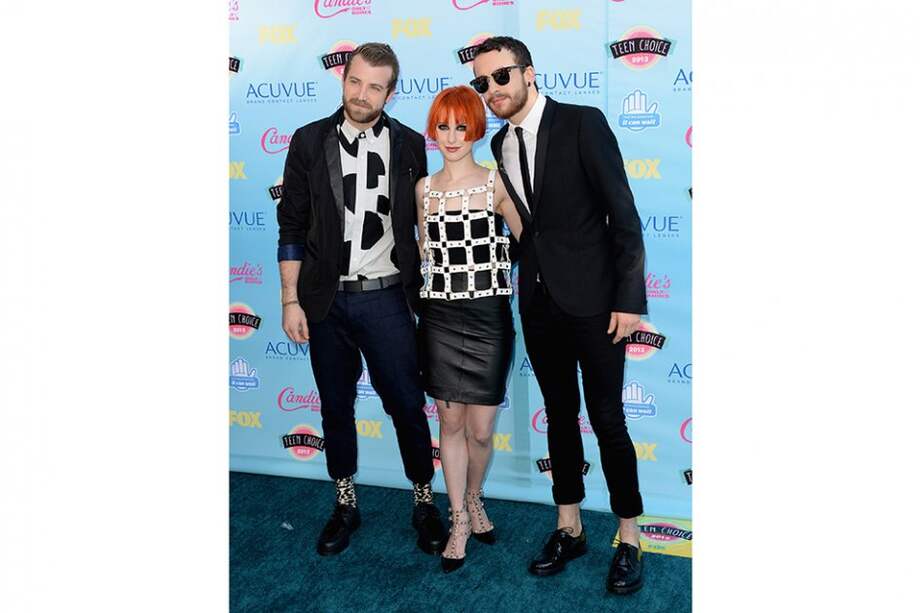 Los músicos Jeremy Davis, Hayley Williams y Taylor York en 2013. / AFP