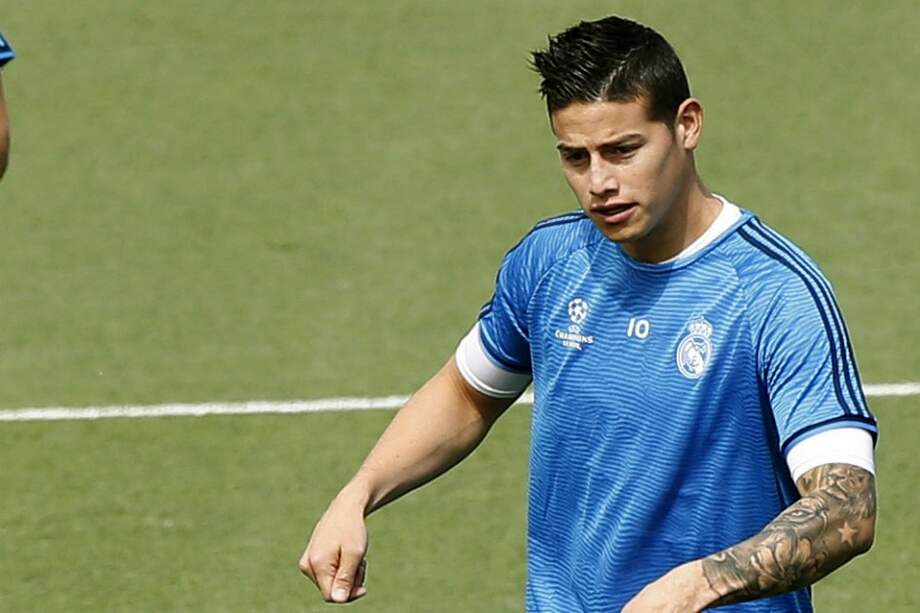 James Rodríguez, durante el entrenamiento de este martes en la Ciudad Deportiva de Valdebebas. / EFE