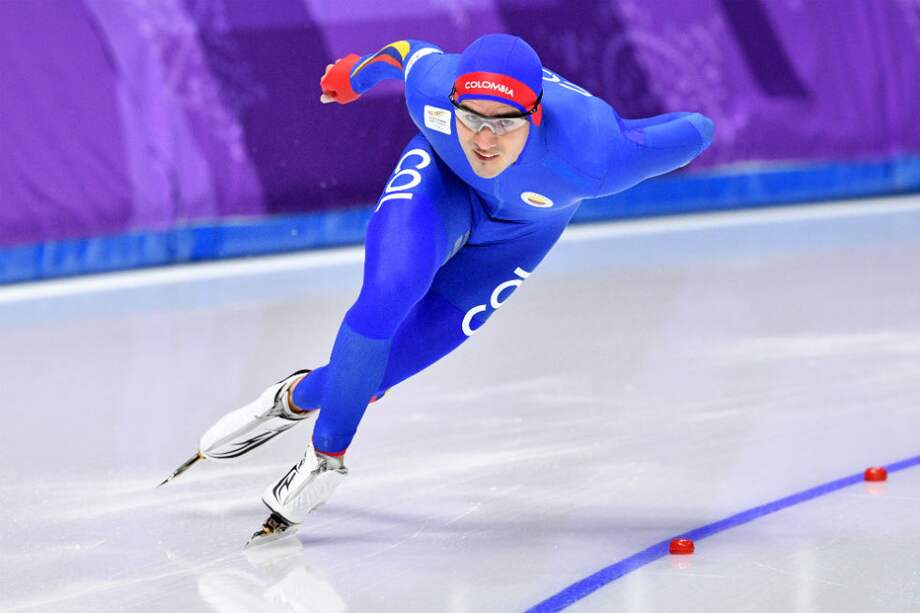 Pedro Causil compite en la prueba de los 1.000 metros en los Juegos Olímpicos de Invierno en Pyeongchang. / AFP