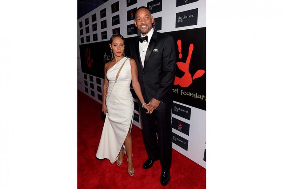 La actriz Jada Pinkett y su esposo, Will Smith. / AFP