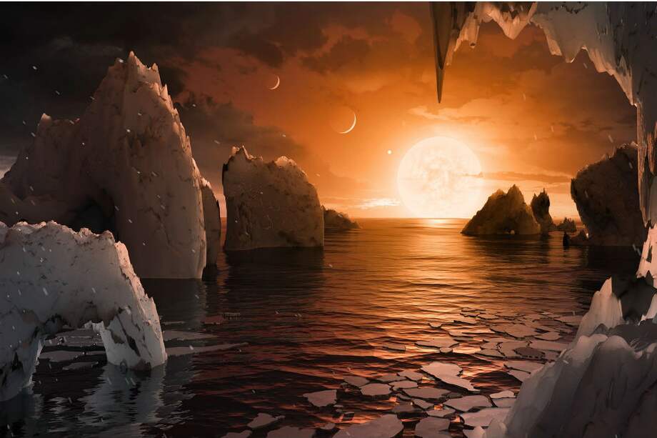 De acuerdo con los investigadores, en los cielos de los planteas que dan vueltas alrededor de la estrella Trappist-1, podrán observarse los cuerpos plantearios vecinos y, además, la estrella de color rosa salmón ocuparía 10 veces más espacio celeste que el que ocupa nuestro sol.
/ Ilustración: Nasa/JPL-Caltech