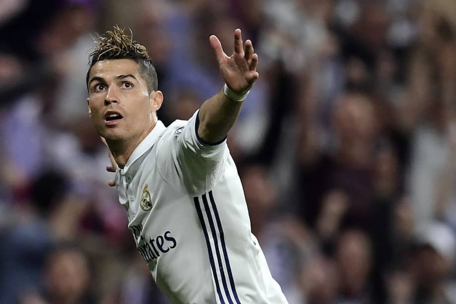 Cristiano Ronaldo marcó tres goles frente al Atlético de Madrid. / AFP