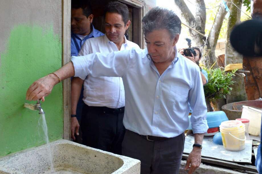 El presidente Juan Manuel Santos y el ministro de Vivienda, Germán Vargas Lleras, esta semana en Barranquilla. / SNP