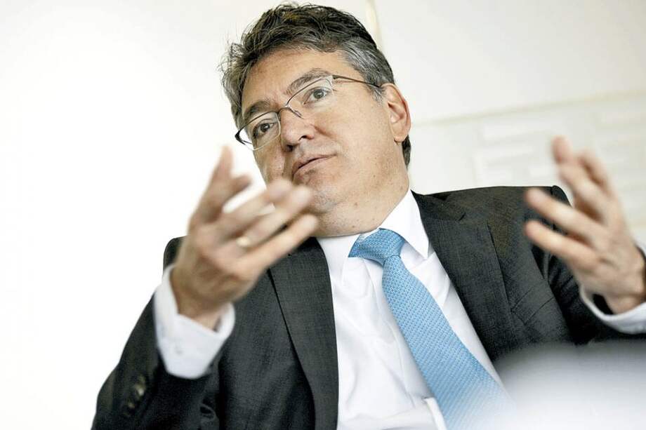 Mauricio Cárdenas, ministro de Hacienda, reveló que el desmonte del 4x1.000 iniciaría en enero de 2015. / Archivo