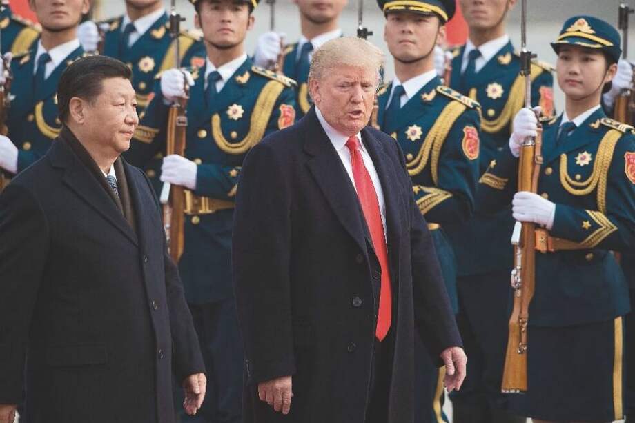 Xi Jinping, presidente de China; Donald Trump, presidente de Estados Unidos. / AFP.