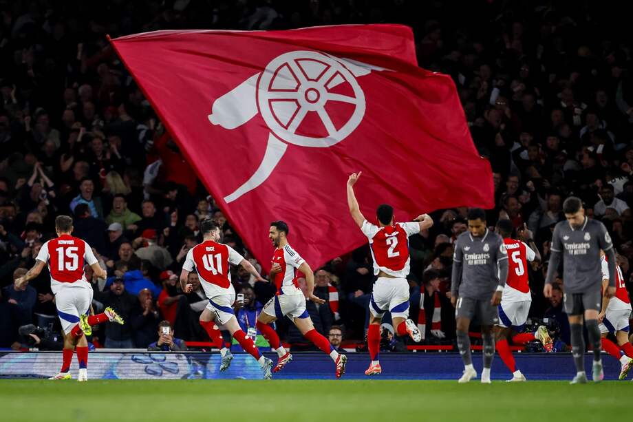 Mikel Merino del Arsenal (3-I) celebra el gol del 3-0 durante el partido de ida de los cuartos de final de la Liga de Campeones de la UEFA entre el Arsenal FC y el Real Madrid en Londres, Gran Bretaña, el 8 de abril de 2025.