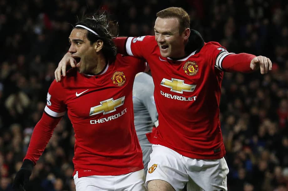 Wayne Rooney celebra con Falcao el primer gol del Manchester United en la victoria 3-1 contra Newcastle. Foto: AFP