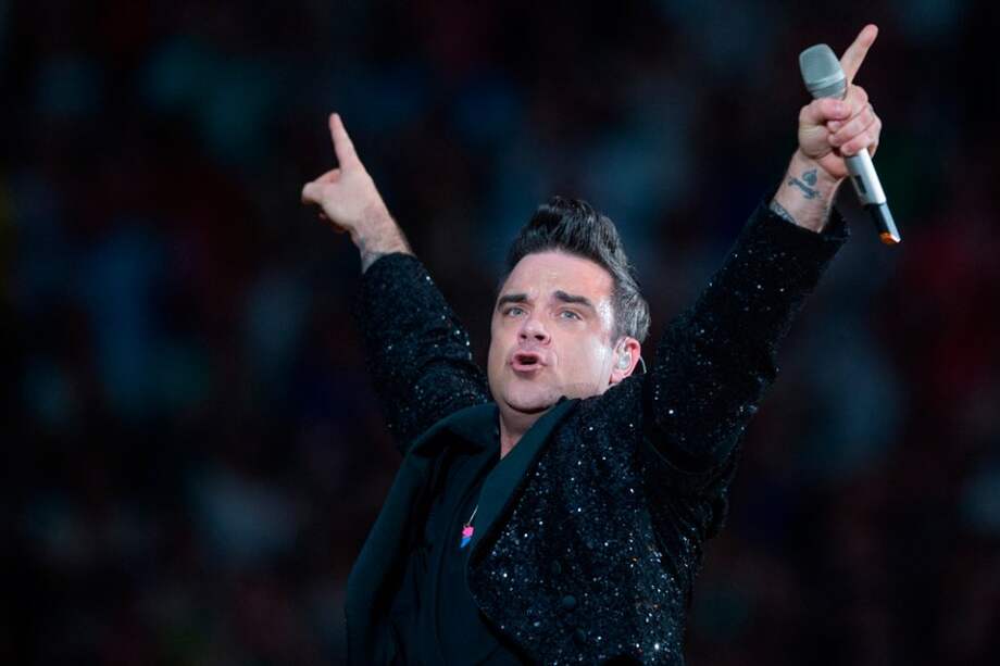 El cantante Robbie Williams en concierto.