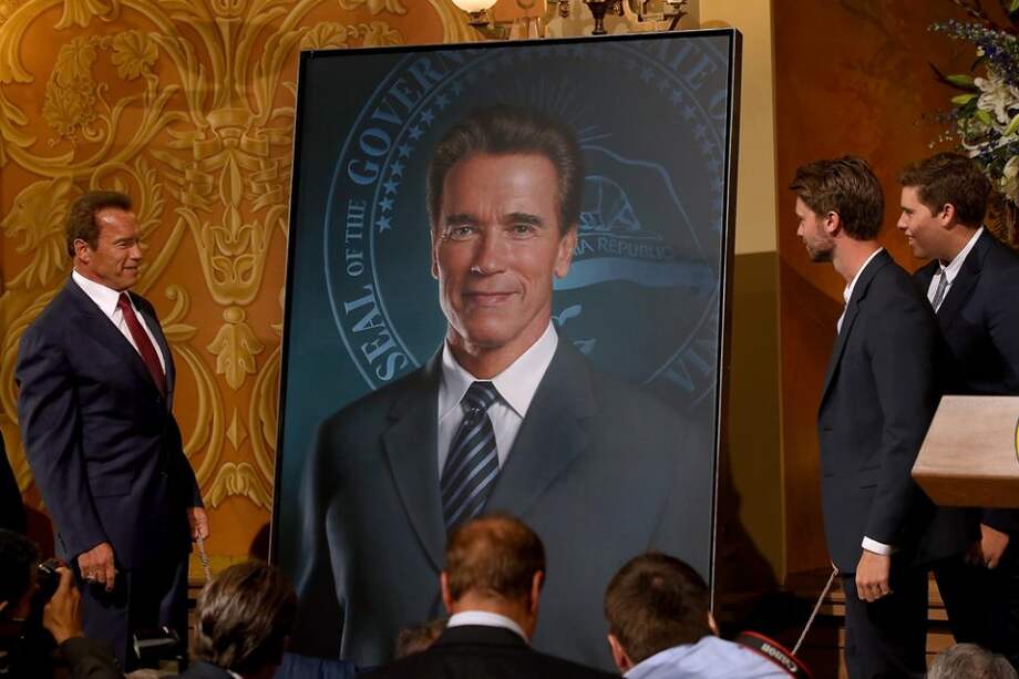 Arnold Schwarzenegger y sus hijos Patrick y Christopher.