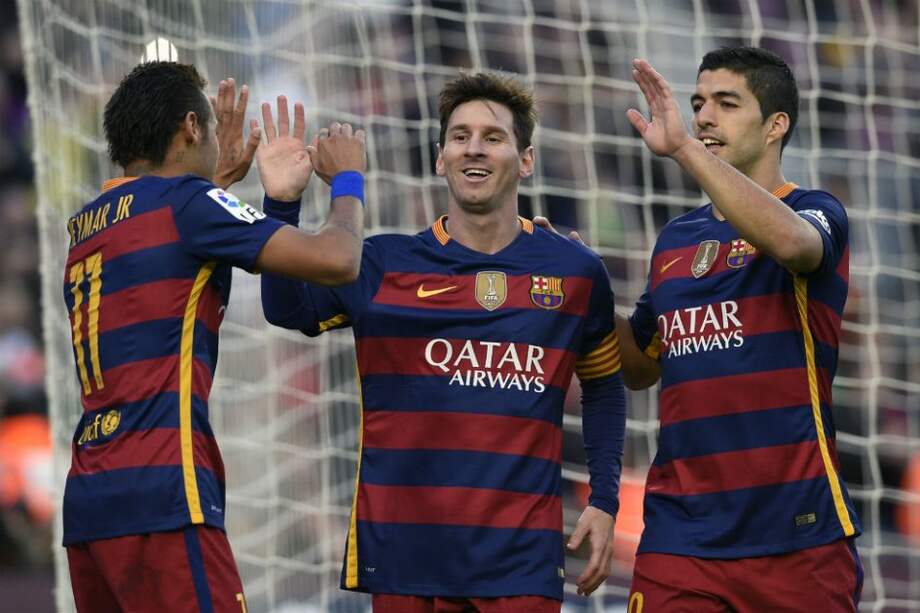 Lionel Messi celebra el tercer tanto del Barcelona contra Granada. Foto: AFP