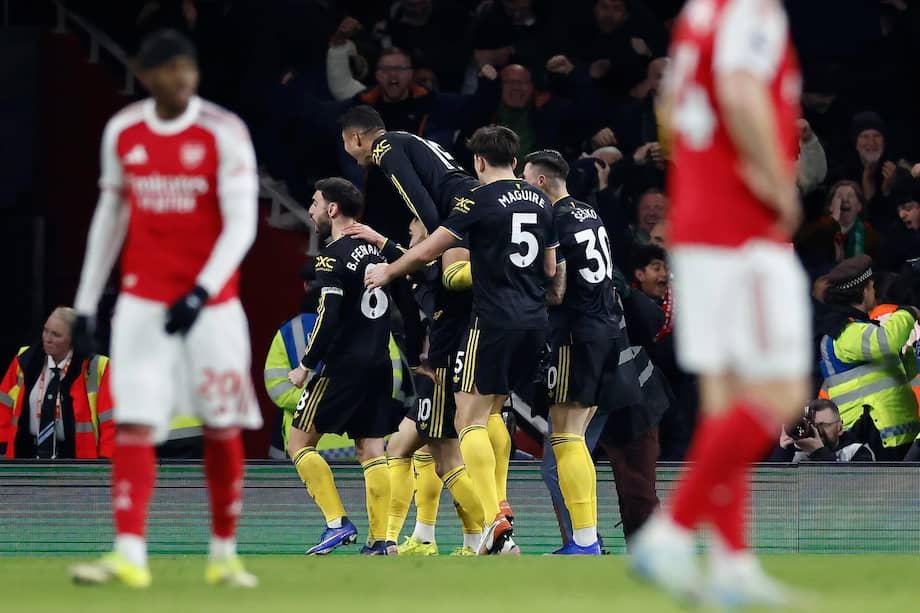 Los jugadores de Manchester United celebran el gol de la victoria 3-2 frente a Arsenal.