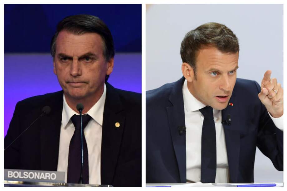 El presidente de Brasil, Jair Bolsonaro (i) y su homólogo de Brasil, Emmanuel Macron. / AFP
