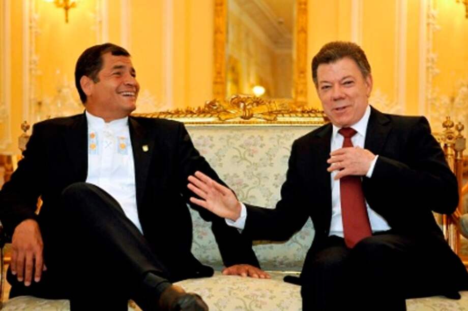 Rafael Correo y Juan Manuel Santos - EFE