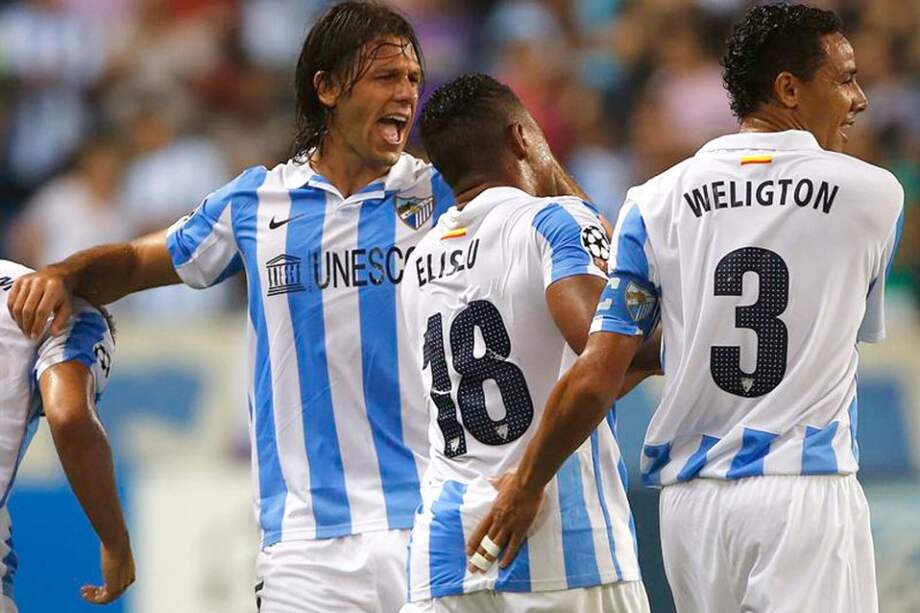 Jugadores del Málga celebran un gol ante Panathinaikos. / EFE