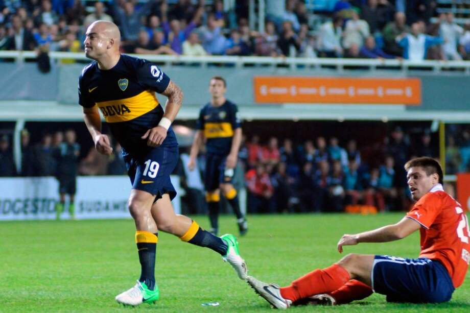 Santiago Silva marcó uno de los goles del equipo 'Xeneize' ante los 'Diablos rojos'. / AFP