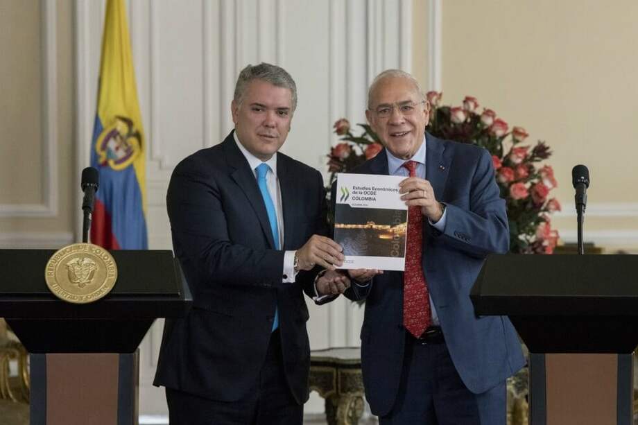 Iván Duque, presidente de Colombia, y José Ángel Gurría,
Secretario general de la OCDE, en una rueda de prensa en octubre de 2019. / Bloomberg.