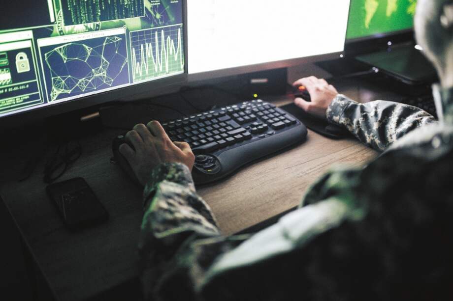 American soldier in headquarter control center