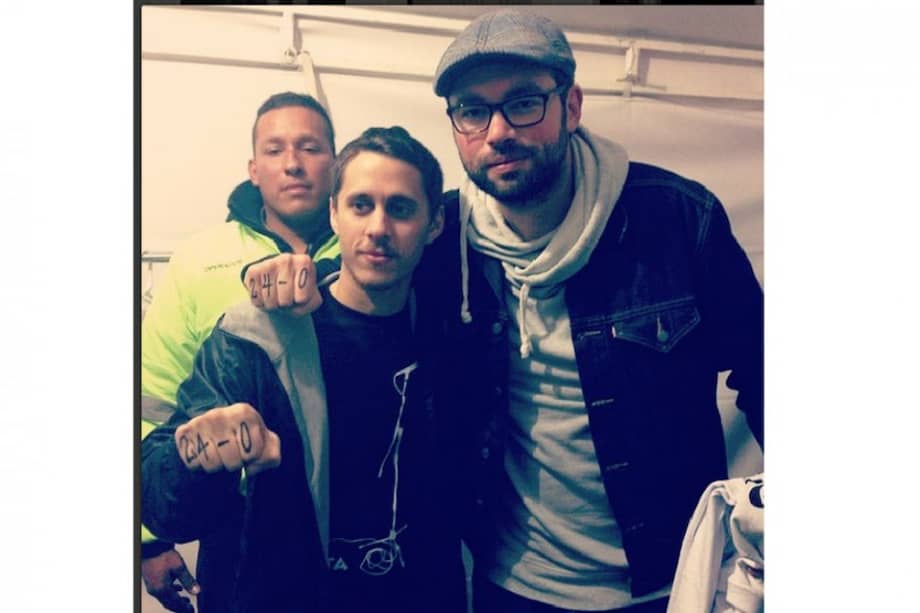 'Canserbero' junto a Santiago Cruz en la jornada 24-0, llevada a cabo en octubre de 2013. / Cuenta de Instagram: @elcanserbero
