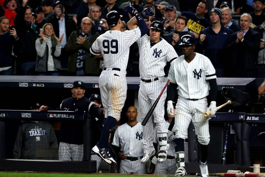 Aaro Judge, Gary Sánchez y Didi Gregorious fueron el corazón del orden al bate de los Yanquis de Nueva York. / AFP