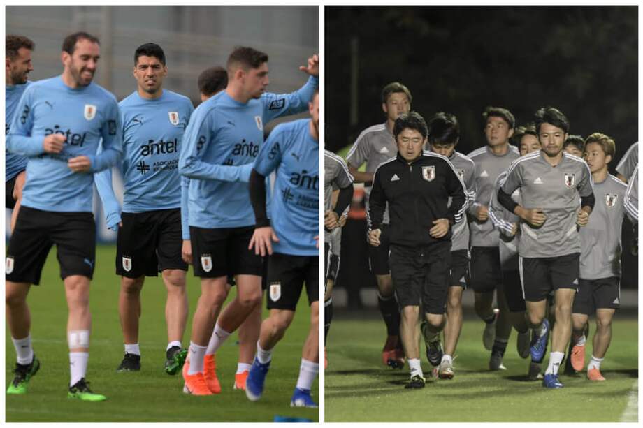 Uruguay (izqu.) y Japón en sus últimas prácticas antes del partido. / AFP
