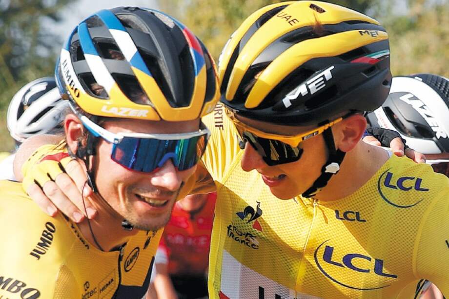 Los ciclistas Primoz Roglic (izq.) y Tadej Pogacar protagonizaron un espectacular final en el Tour de Francia.