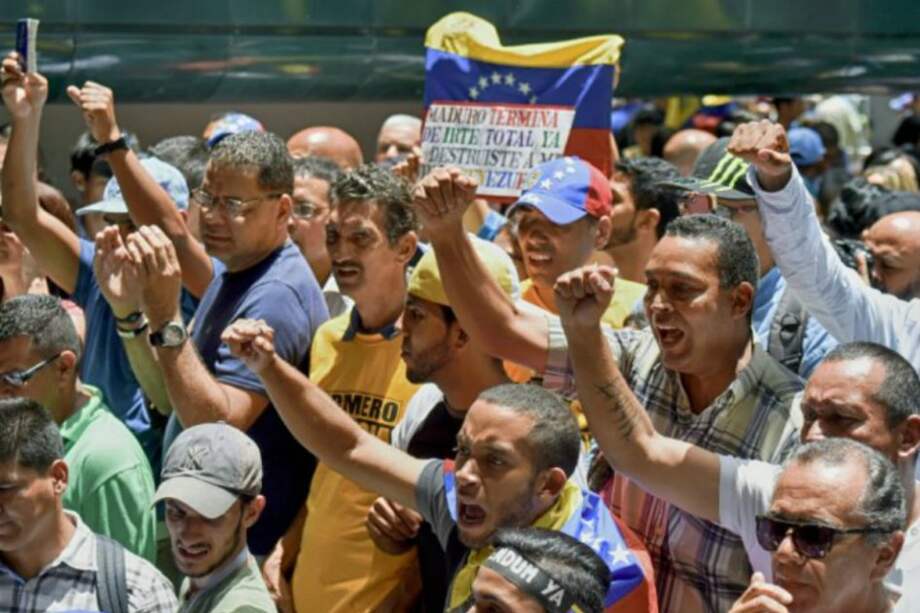 Imagen de la marcha que protagonizaron el pasado 26 de mayo maestros y estudiantes de universidades públicas de Venezuela / AFP