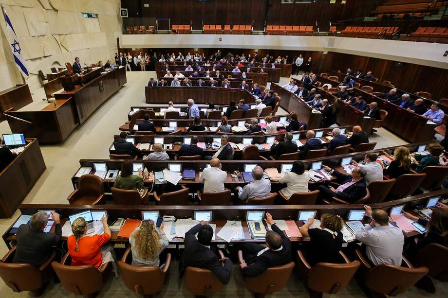 El parlamento israelí aprobó este jueves la polémica ley luego de un aireado debate. / AFP