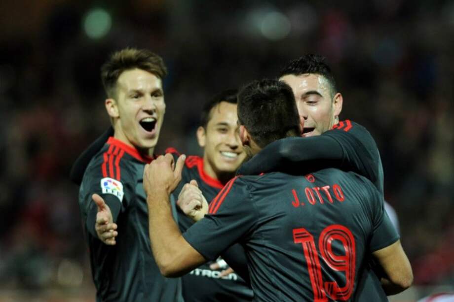 Los jugadores del Celta de Vigo celebran un gol en la victoria ante el Granada por la reciente fecha de la Liga BBVA. / AFP