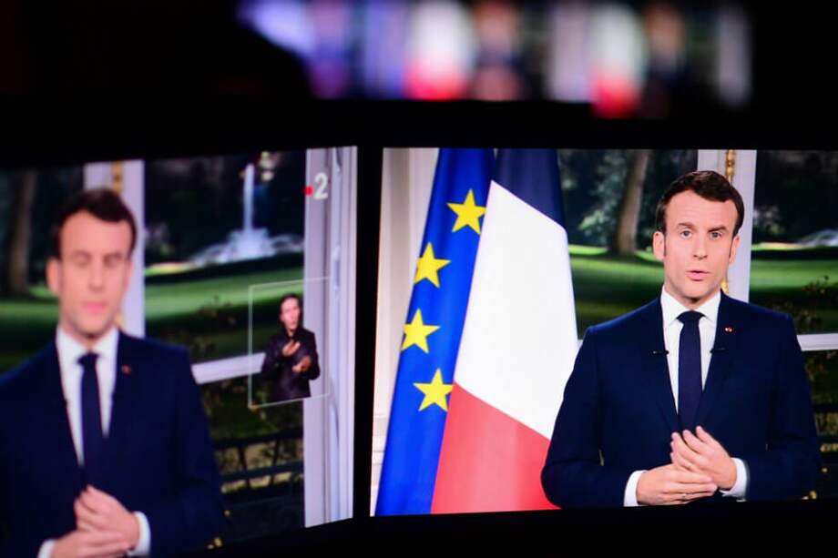 En su tradicional mensaje de Año Nuevo, el presidente francés defendió su impopular reforma a las pensiones. / AFP