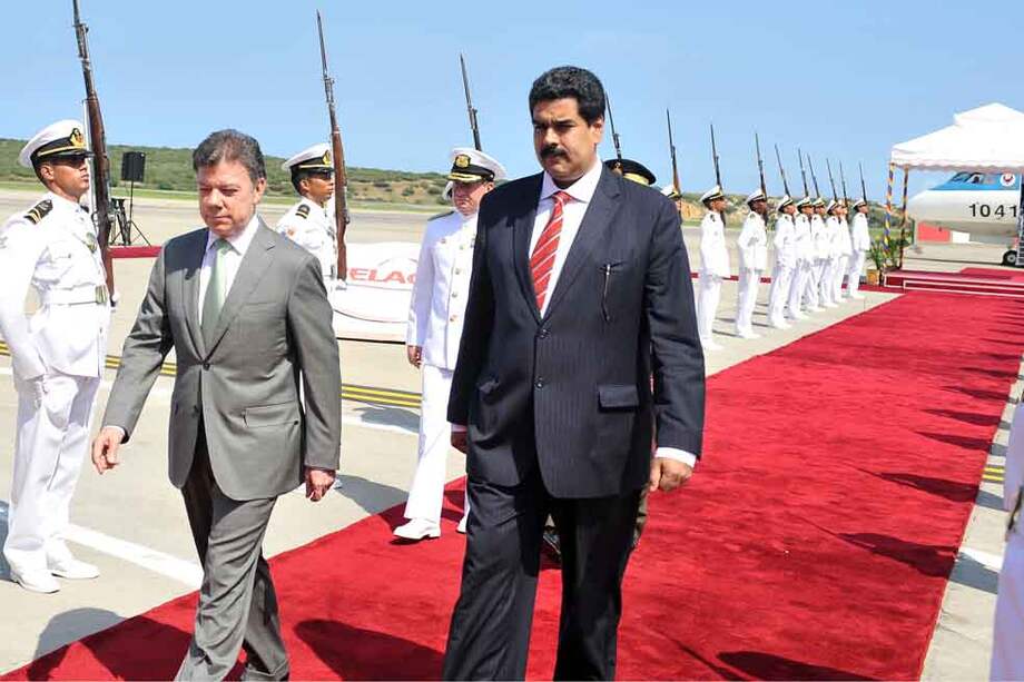En varias ocasiones, como canciller, el hoy presidente Nicolás Maduro (der.) recibió al presidente Santos en su país. / Presidencia