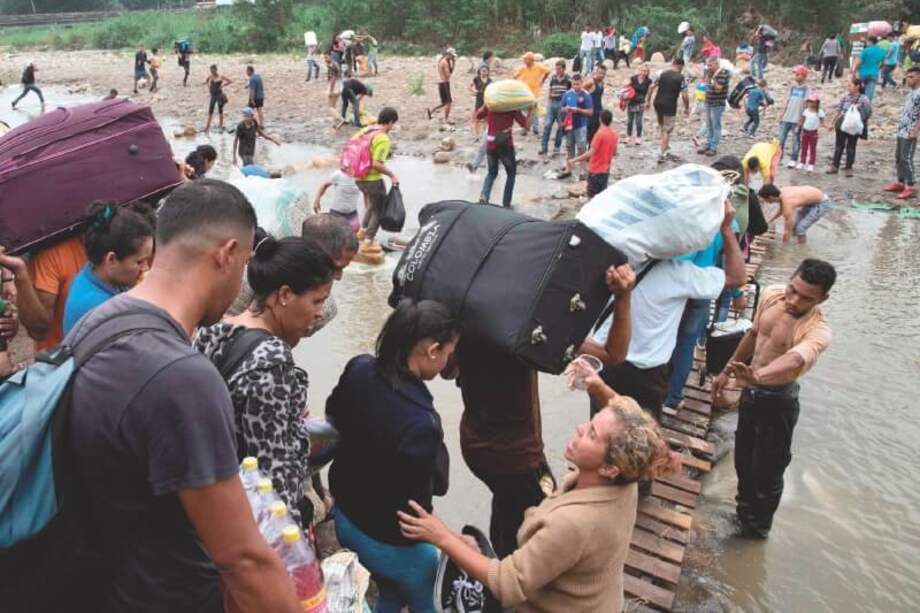 La crisis migratoria en Venezuela se ha convertido en uno de los principales desafíos para la región. / AFP