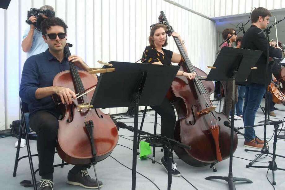 Este miércoles, la sección de cuerdas de la Sinfónica del Nuevo Mundo interpretó temas como "Hey Jude", "Let it be", "With a Little Help from My Friends" o "Yellow Submarine". / EFE