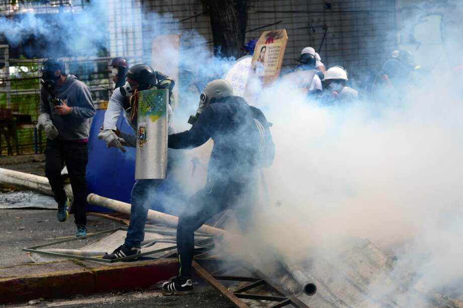 Estas muertes elevan a 99 el número de fallecidos en casi cuatro meses de protestas. / AFP.