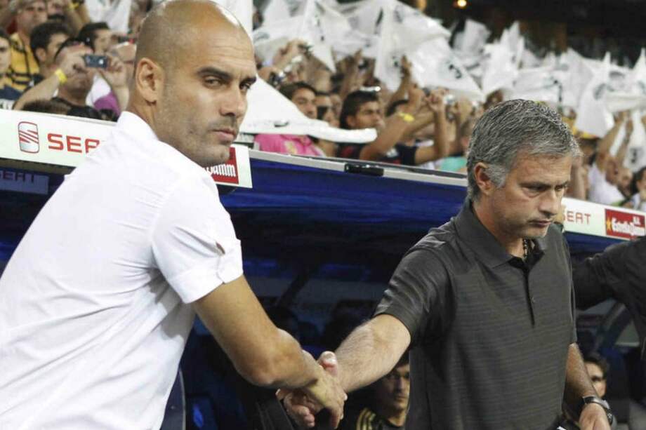 Pep Guardiola y José Mourinho, en un partido Barcelona-Real Madrid. / EFE
