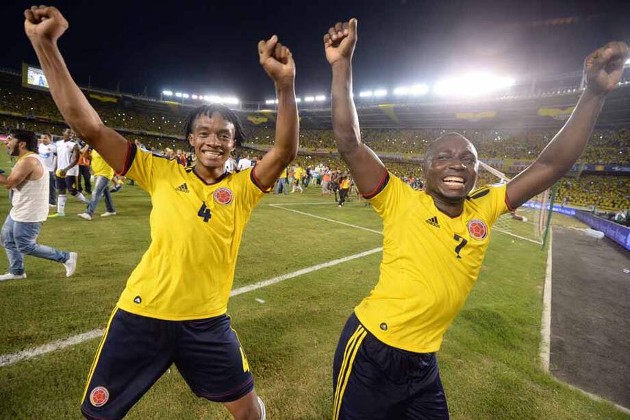 Así celebraron Juan Guillermo Cuadrado y Pablo Armero la clasificación de Colombia. /AFP