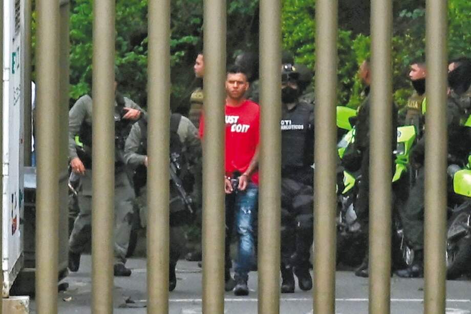 Los capturados fueron transportados a la primera audiencia en medio de un robusto esquema de seguridad. / Joaquín Sarmiento - AFP