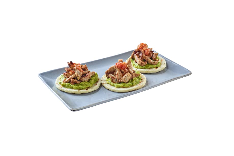 Arepas con fajitas de carne de cerdo.